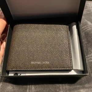 Michael Kors men’s wallet brand new with tags!